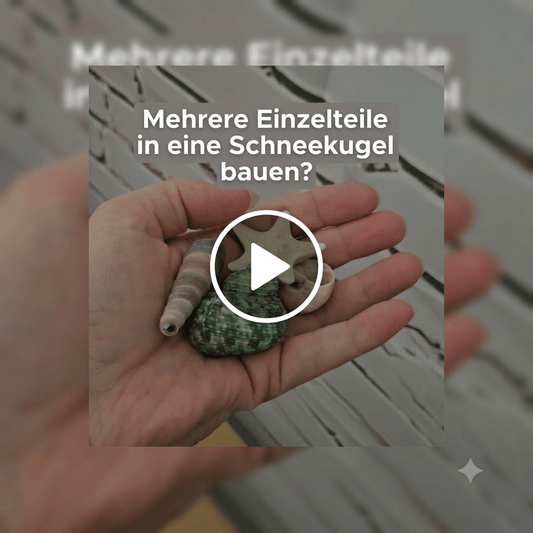 Die Kunst der Stabilität: Wie Sie mehrere Einzelteile präzise in einer Schneekugel platzieren - Schneekugelhaus