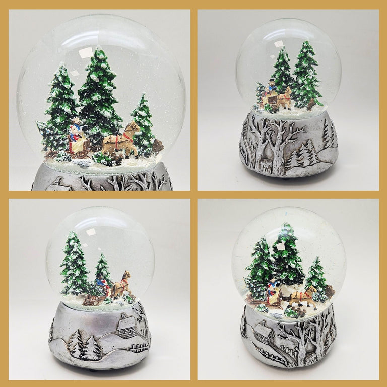 Nostalgische Schneekugel Schlittenfahrt auf Silber Landschaft 100 mm Durchmesser mit Spieluhr - Schneekugelhaus