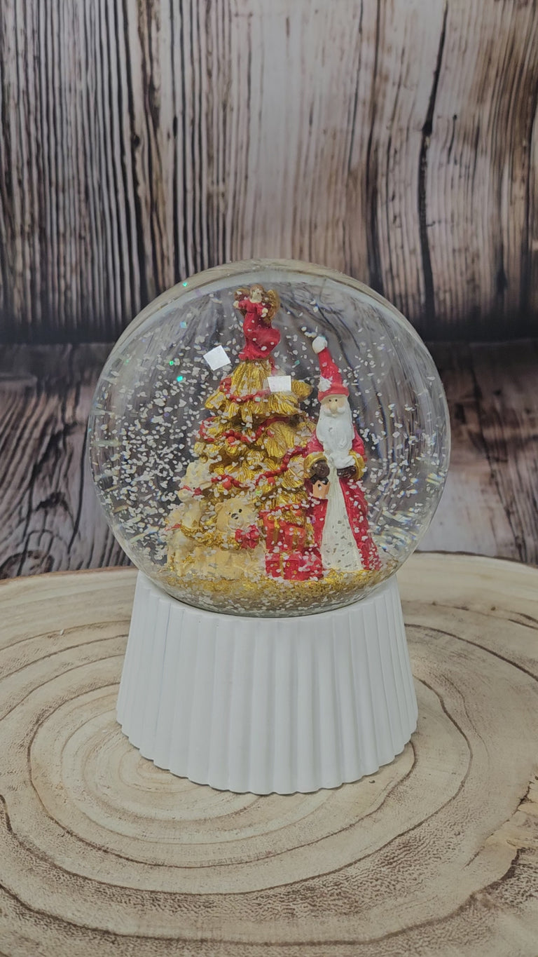 Schneekugel Weihnachtsmann mit Spieluhr, rot, gold weiß auf weiß geriffelt - 120 mm Durchmesser